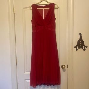 Red pleated sleeveless White House black market dress. Worn only once.